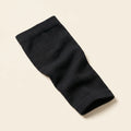 Manchon de compression mollet Flexnea noir tricoté, sur fond crème