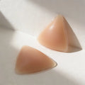 A pair of triangular Plunge Inserts cut on the diagonal