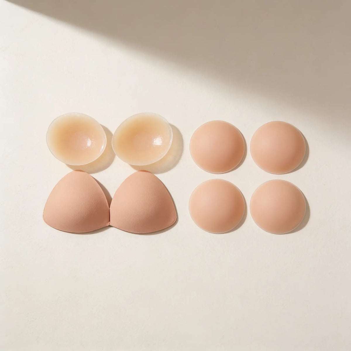 The Starter Set: a pair of inserts beside a pair of nipple covers